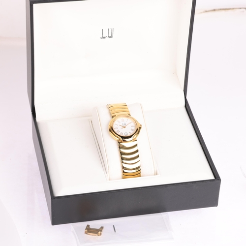 2050 - DUNHILL - a lady's gold plated stainless steel Millennium quartz bracelet watch, ref. 8000, white di... 