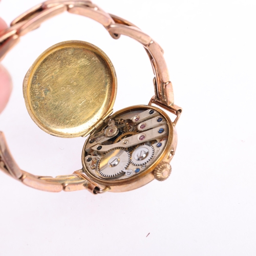 2055 - J W BENSON - an early 20th century 9ct rose gold mechanical bracelet watch, silvered dial with Arabi... 