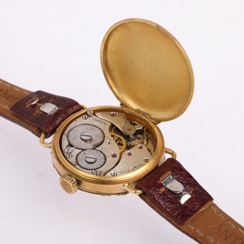 2056 - An Art Nouveau French lady's 18ct gold mechanical wristwatch, circa 1910, silvered dial with Arabic ... 