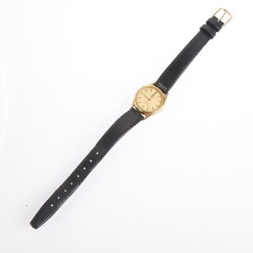 2058 - OMEGA - a lady's gold plated stainless steel De Ville quartz wristwatch, ref. 1365, engine turned ch... 