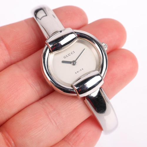 GUCCI a lady s stainless steel 1400L quartz bangle watch serial no. 0188862 case width 25mm wor