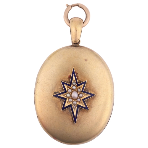 2102 - A Victorian split pearl and blue enamel star photo locket pendant, circa 1880, oval form with applie... 