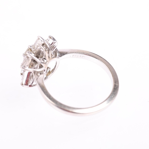 2105 - KUTCHINSKY - a diamond snowflake cluster ring, set with modern round brilliant and baguette-cut diam... 