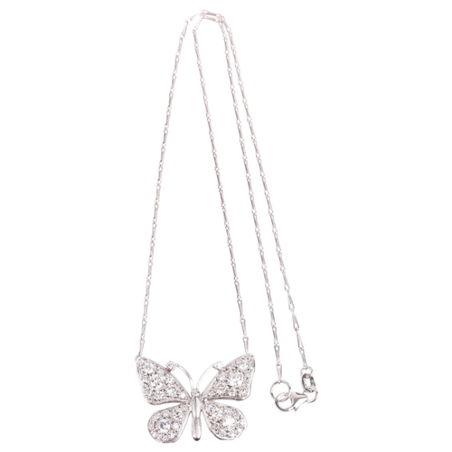 2119 - An 18ct white gold diamond butterfly pendant necklace, by Peter Farrow, pave set with modern round b... 