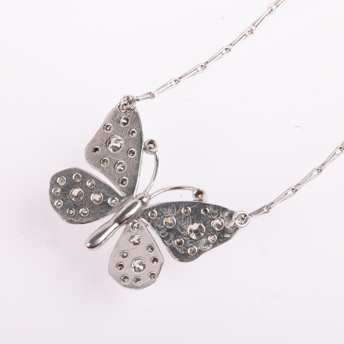 2119 - An 18ct white gold diamond butterfly pendant necklace, by Peter Farrow, pave set with modern round b... 