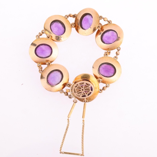 2121 - A 1970s 9ct gold amethyst panel bracelet, maker JR, Birmingham 1974, each oval panel rub-over set wi... 