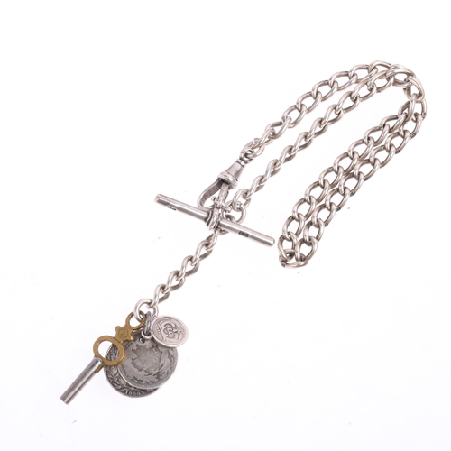 2524 - An early 20th century silver solid curb link Albert chain necklace, with dog clip T-bar and coin cha... 