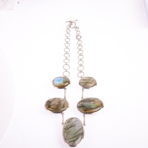 2526 - A large sterling silver labradorite panel necklace, set with graduated oval cabochon labradorite, la... 