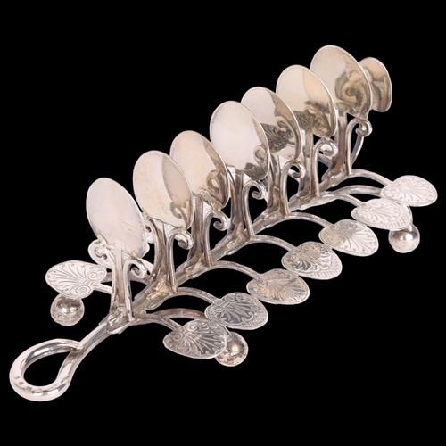 2652 - A Victorian silver naturalistic 8-bar toast rack, Aston & Son, Birmingham 1858, leaf petal and tendr... 