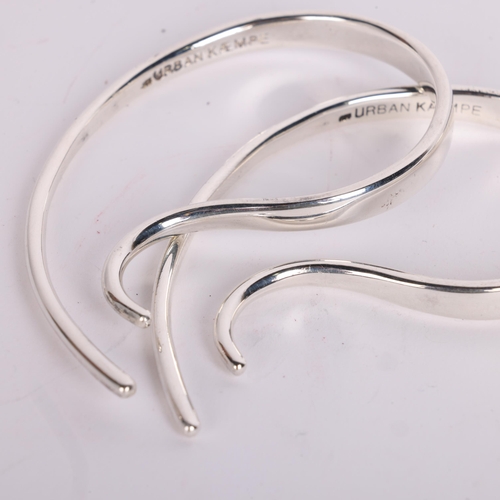 2658 - CAMILLA URBAN & VON LOTZBECH - a pair of Danish modernist sterling silver abstract napkin rings, 8cm... 