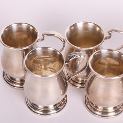 2662 - A cased set of 8 George V novelty silver miniature tankard drinking tots, Adie Brothers Ltd, Birming... 