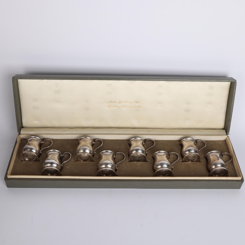 2662 - A cased set of 8 George V novelty silver miniature tankard drinking tots, Adie Brothers Ltd, Birming... 