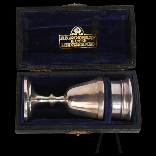 2664 - A cased George VI silver 2-piece travelling communion set, Mowbray & Co, London 1948, comprising com... 