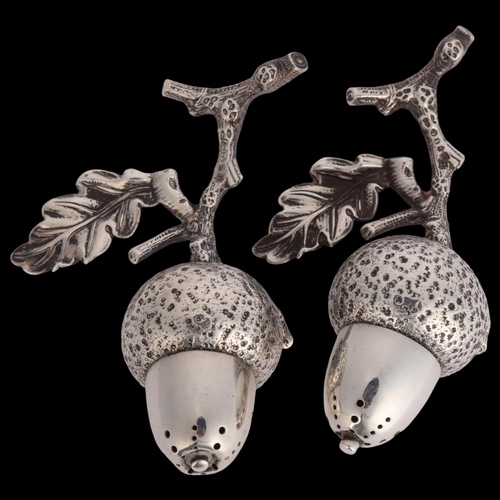 2667 - **CONDITION REPORT CHANGE** A pair of Victorian novelty silver 'Acorn' table pepperettes, Hukin & He... 