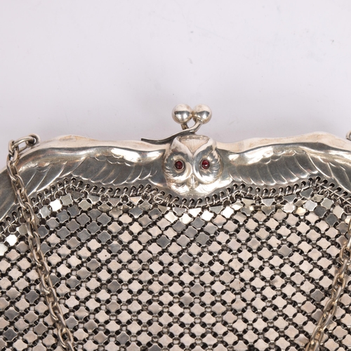 2677 - An Art Nouveau German 800 silver garnet owl evening bag, frame width 16.5cm, 7.9oz gross