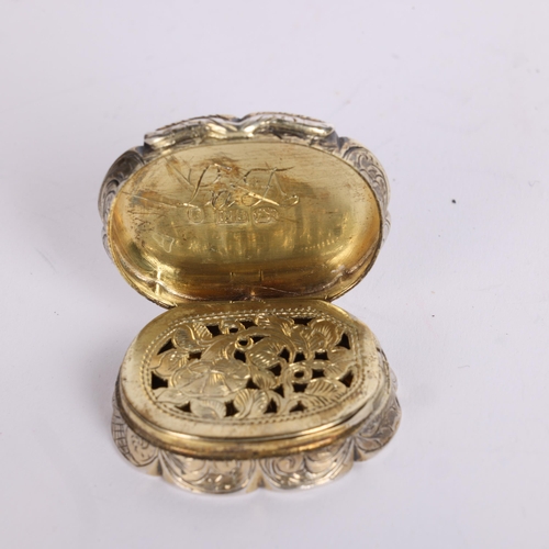 2678 - A Victorian silver vinaigrette, Edward Smith, Birmingham 1853, oval scalloped form with engine turne... 