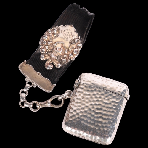 2688 - A late Victorian silver planished Vesta case, with silver armorial fob Vesta, 4.5cm x 4cm