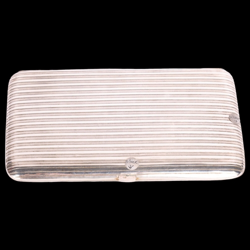 2695 - A large Portuguese silver cigarette case, circa 1900, rectangular form with ribbed decoration and gi... 