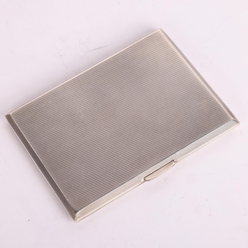 2696 - An Elizabeth II silver cigarette case, WT Toghill & Co, Birmingham 1956, rectangular form with allov... 