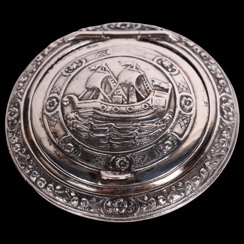 2698 - A Scandinavian silver Viking Revival 'Galleon' powder compact, relief embossed decoration, 5.5cm, 1.... 