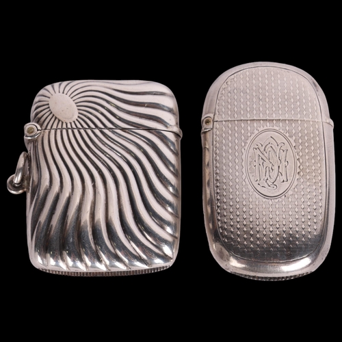 2701 - 2 silver Vesta cases, including relief embossed sunburst example, 5cm x 4cm (2)