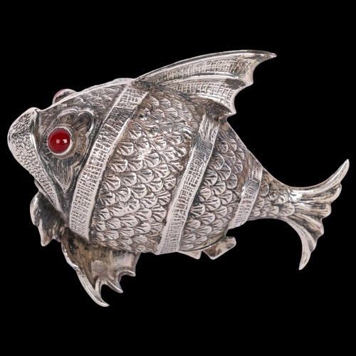 2721 - A Spanish novelty silver fish pepperette, relief embossed decoration with red glass eyes and pentagr... 