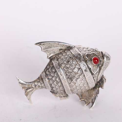 2721 - A Spanish novelty silver fish pepperette, relief embossed decoration with red glass eyes and pentagr... 