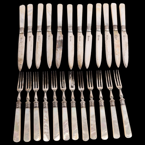 2740 - A set of George V mother-of-pearl handled silver dessert cutlery for 12 people, Cooper Brothers & So... 