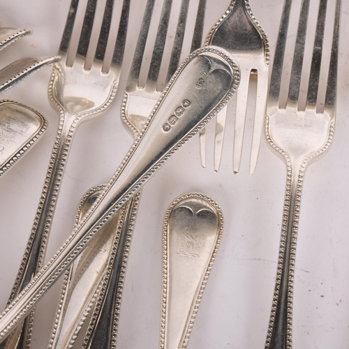 2741 - A quantity of Victorian silver Old English Bead Edge pattern flatware, mostly Chawner & Co, London 1... 