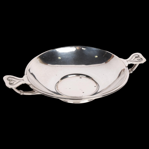 2747 - CHRISTIAN ACTONIUS THEODORUS PIIL - a Danish secessionist silver 2-handled bowl, circa 1873, circula... 