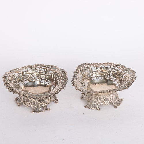 2748 - A pair of late Victorian silver heart bon bon dishes, William Comyns & Sons Ltd, London 1893, relief... 