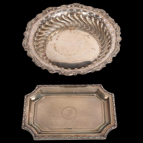 2749 - An Edwardian circular silver bon bon dish, Birmingham 1905, and an Art Deco silver dressing table pi... 