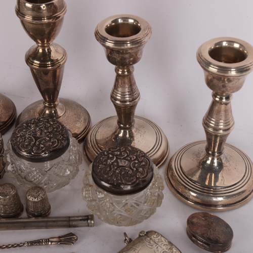 2750 - Various silver, including pair of candlesticks, thimbles, dressing table jars, Vesta case, etc