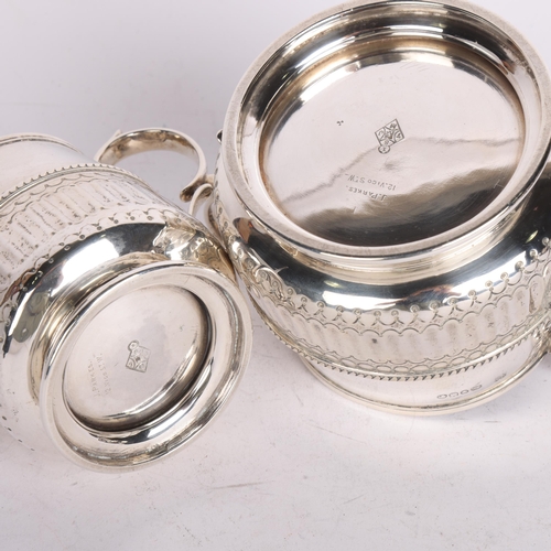 2763 - A Victorian silver sugar bowl and cream jug set, Holland, Son & Slater, London 1892, tapered cylindr... 