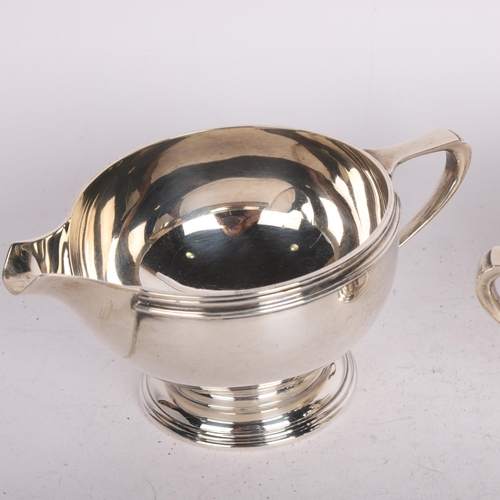 2764 - A George VI silver sugar bowl and cream jug set, Mappin & Webb, Sheffield 1942, jug height 6.5cm, 13... 