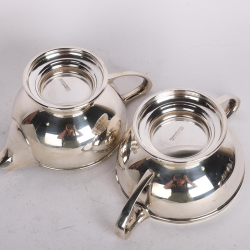 2764 - A George VI silver sugar bowl and cream jug set, Mappin & Webb, Sheffield 1942, jug height 6.5cm, 13... 