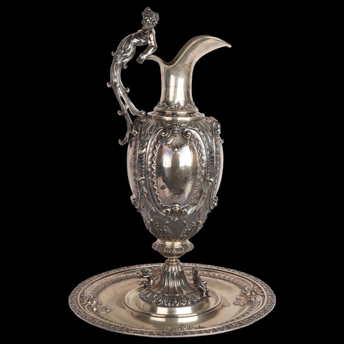 2766 - A large and impressive Italian 800 silver Rococo Revival wine ewer and stand, with Bacchanalian figu... 