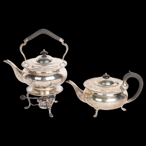 2769 - An Edwardian silver 2-piece tea set, Atkin Brothers, Sheffield 1909, comprising spirit kettle on bur... 