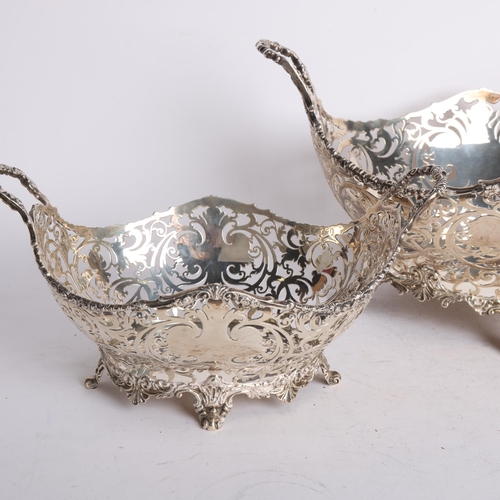 2770 - An impressive set of 3 George V silver 2-handled table centre baskets, Mappin & Webb limited, London... 