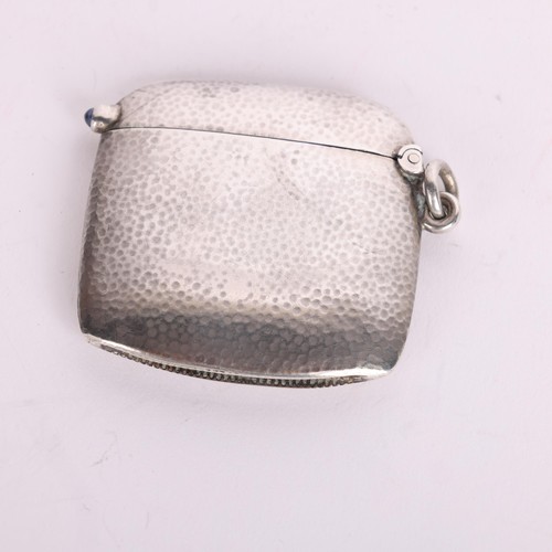 2688A - An Art Deco Continental 800 silver planished Vesta case, with cabochon sapphire thumbpiece, 4.5cm x ... 