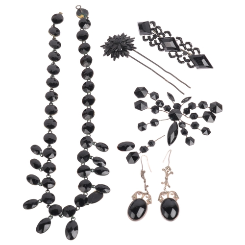 2627 - Various French jet black glass jewellery, including fringe necklace, butterfly brooch, flower hairpi... 