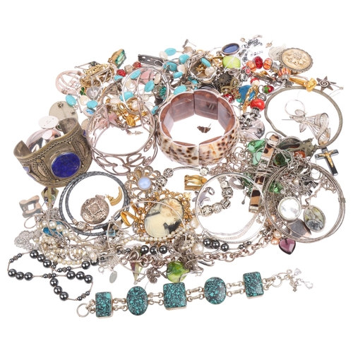 2634 - A large quantity of various jewellery, including some silver, Pandora cord bracelet, large Ethnic la... 