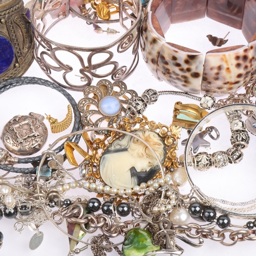 2634 - A large quantity of various jewellery, including some silver, Pandora cord bracelet, large Ethnic la... 