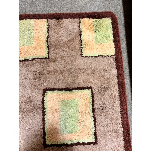 317 - A 1930s Art Deco modernist hand tufted rug, 130 x 70cm