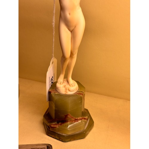 28 - Art Nouveau simulated ivory Classical nude on onyx base, unsigned, height 18cm