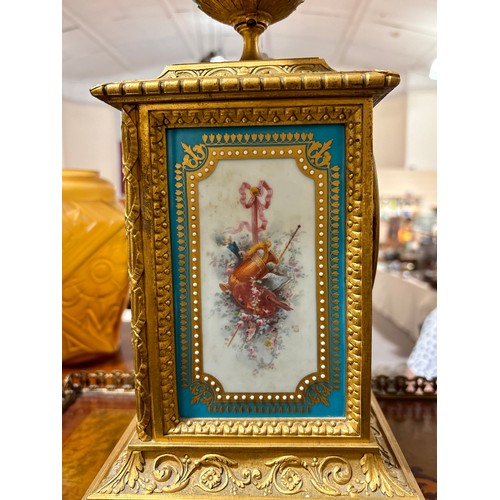 888 - A fine 19th century gilt-bronze and porcelain 8-day mantel clock, with hand painted panels depicting... 