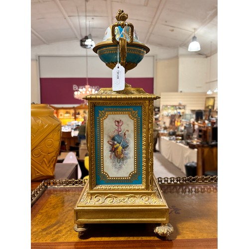 888 - A fine 19th century gilt-bronze and porcelain 8-day mantel clock, with hand painted panels depicting... 