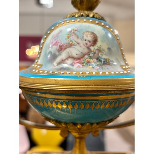 888 - A fine 19th century gilt-bronze and porcelain 8-day mantel clock, with hand painted panels depicting... 