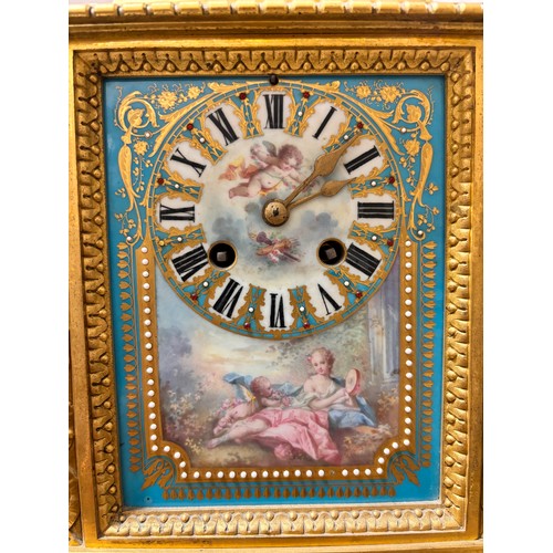 888 - A fine 19th century gilt-bronze and porcelain 8-day mantel clock, with hand painted panels depicting... 