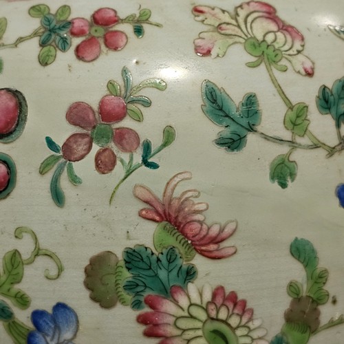 784 - A Chinese 19th century famille rose porcelain jar and cover, with painted enamel insects and flowers... 